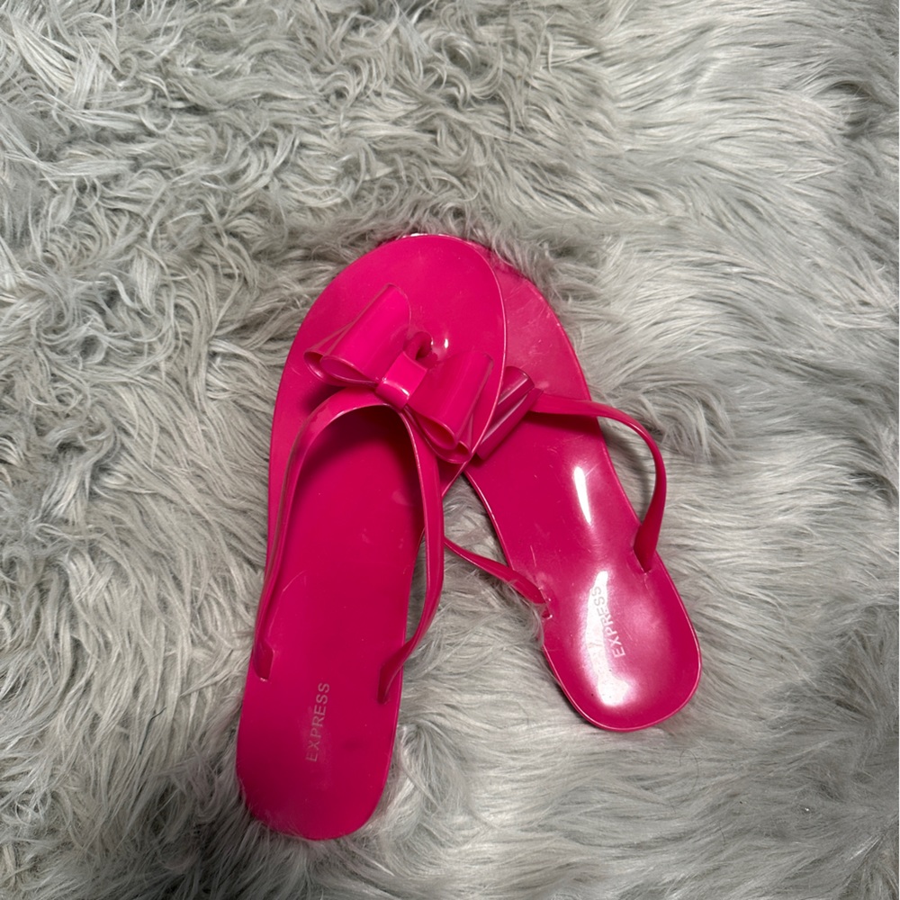 Hot pink Barbie flip flops